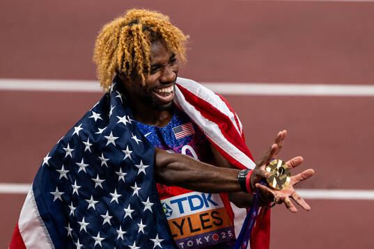 Noah Lyles of USA celebrates