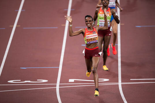 Beatrice Chebet of Kenya celebrates