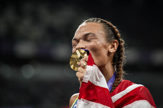 Anna Hall of USA celebrates