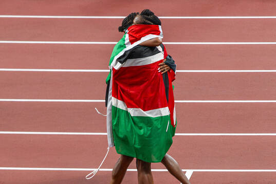 Beatrice Chebet and Faith Kipyegon of Kenya celebrate
