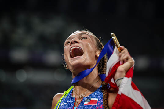 Anna Hall of USA celebrates