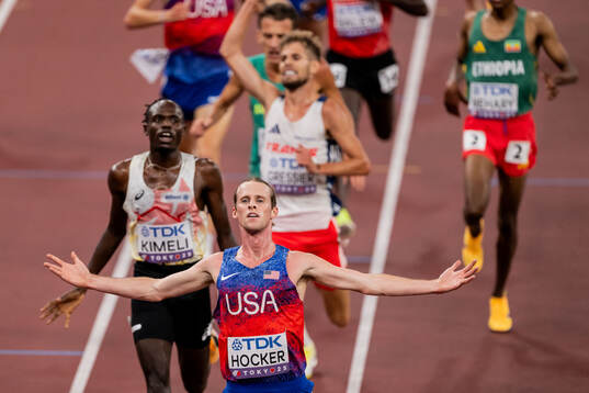 Cole Hocker of USA celebrates winning men's 5000 meters