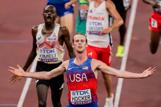 Cole Hocker of USA celebrates winning men's 5000 meters