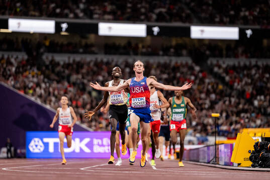 Cole Hocker of USA celebrates winning men's 5000 meters