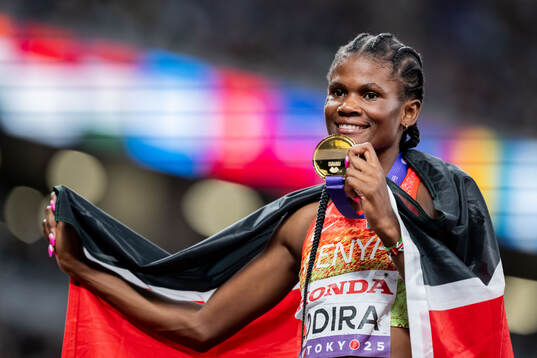 Lilian Odira of Kenya celebrates winning gold in women’s