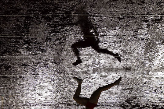The silhouette of Magdalena Niemczyk of Poland competing in