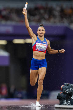 Sydney McLaughlin-Levrone of USA celebrates winning the