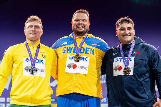 Silver medalist Mykolas Alekna of Lithuania, gold medalist