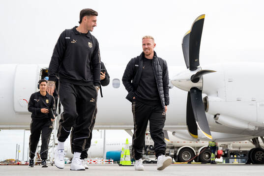 Goalkeeper Andreas Linde and Mikkel Rygaard Jensen