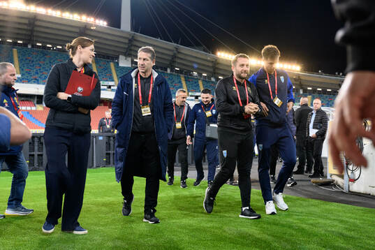 Head coach Franco Foda and Fisnik Asllani of Kosovo