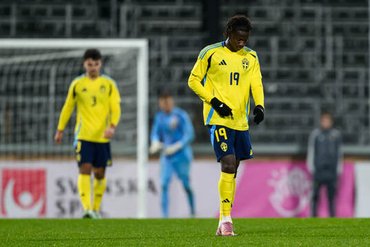 Alieu Njie of Sweden looks dejected