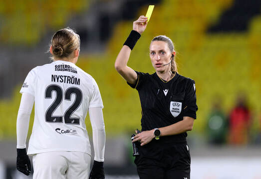 Paulina Nyström of Häcken receives a yellow card from