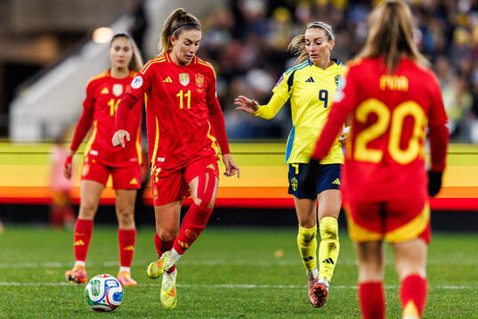 Alexia Putellas of Spain and Kosovare Asllani of Sweden