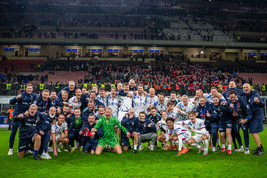 Players and staff of Norway celebrate