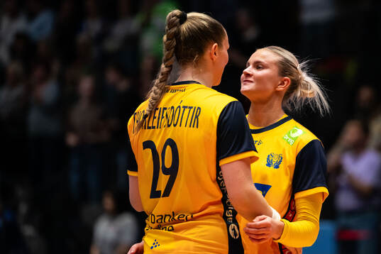 Kristin Thorleifsdottir and Clara Lerby of Sweden celebrate