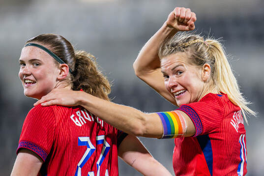 Signe Gaupset of Norway celebrates with teammate Ada