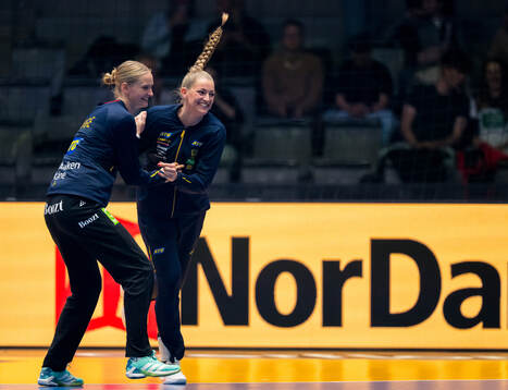 Goalkeeper Johanna Bundsen and Kristin Thorleifsdottir of