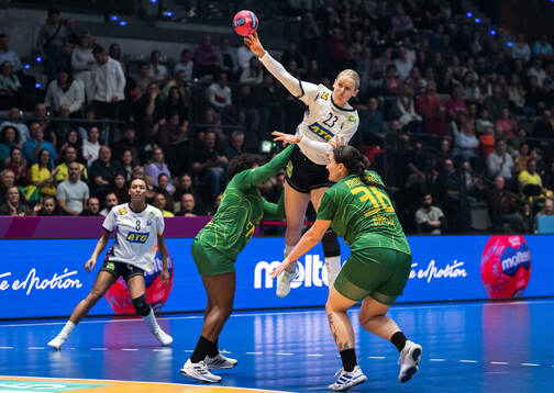 Mariane Fernandes and Marcela Arounian of Brazil and Emma