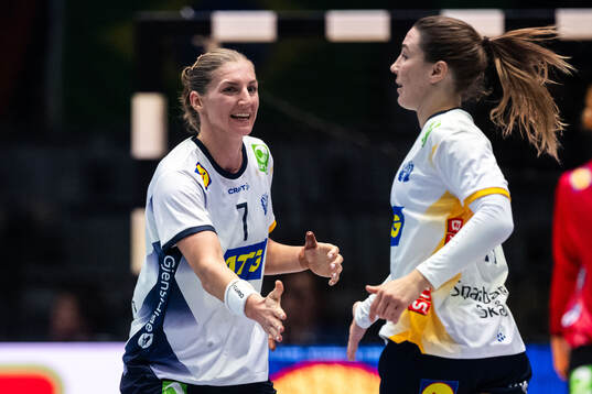 Linn Blohm and Anna Lagerquist of Sweden celebrate