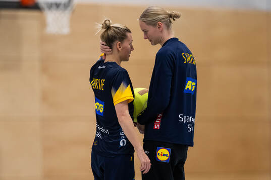 Nathalie Hagman and goalkeeper Johanna Bundsen of the