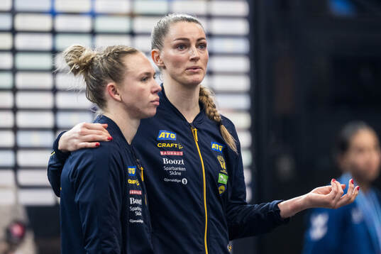 Jenny Carlson and Kristin Thorleifsdottir of Sweden look