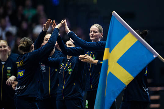 Olivia Löfqvist and Goalkeeper Johanna Bundsen of Sweden