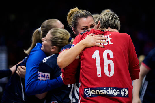Nora Mørk and Goalkeeper Katrine Lunde of Norway celebrate