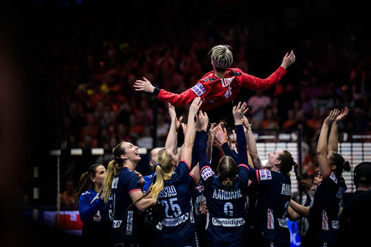 Goalkeeper Katrine Lunde of Norway celebrates with teammates