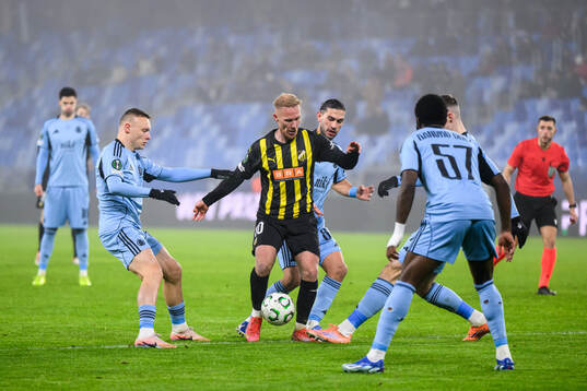 Mikkel Rygaard Jensen of Häcken and Artur Gajdos of Slovan