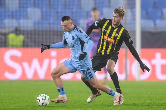 Nino Marcelli of Slovan Bratislava and Filip Helander of