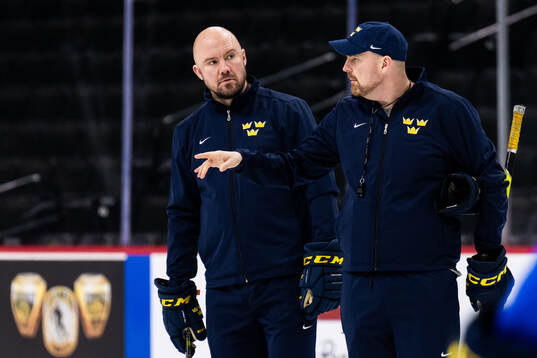 Assistant coaches Nicklas Grossmann and Gereon Dahlgren of