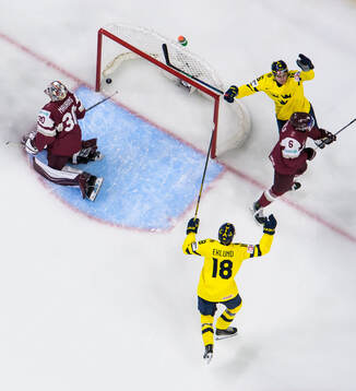 Victor Eklund and Anton Frondell of Sweden celebrate the