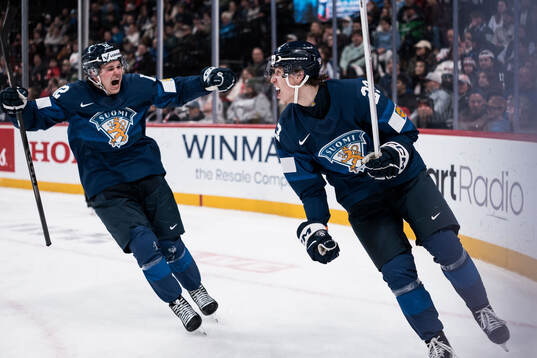 Joona Saarelainen and Leo Tuuva of Finland celebrates