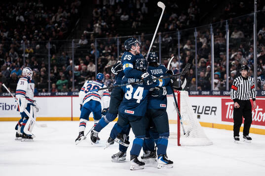 Players of Finland celebrate the 2-3 goal