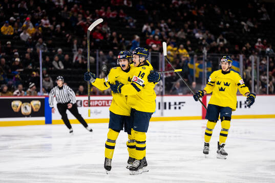 Victor Eklund and Linus Eriksson of Sweden celebrate the