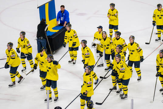 Players of Sweden celebrate