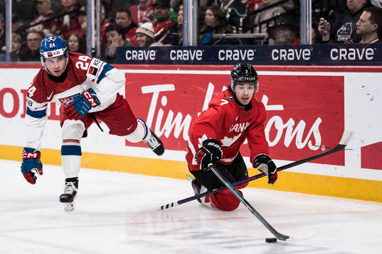 Adam Novotny of Czech Republic and Michael Misa of Canada
