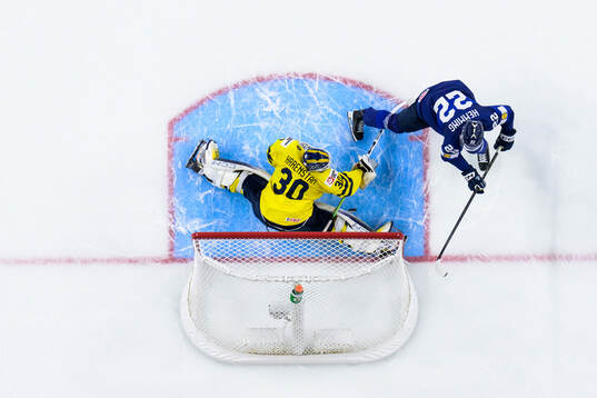 Goaltender Love Härenstam of Sweden makes a save