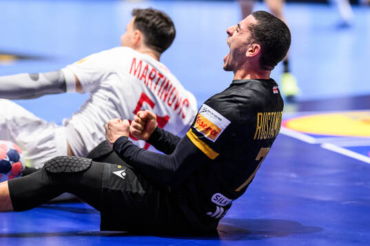 Khazein Rustamov of Georgia celebrates