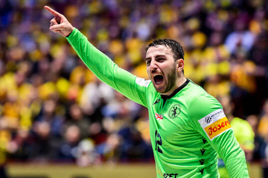 Goalkeeper Zurab Tsintsadze of Georgia celebrates