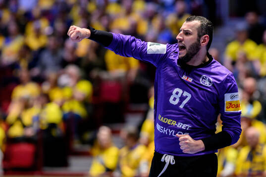 goalkeeper David Nikabadze of Georgia celebrates