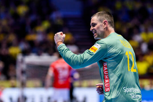 Goalkeeper Andreas Palicka of Sweden celebrates