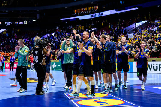 Players of Sweden celebrate