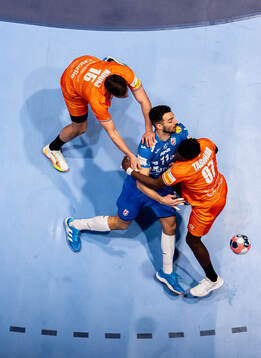Zvonimir Srna of Croatia against Lars Kooij and Reinier