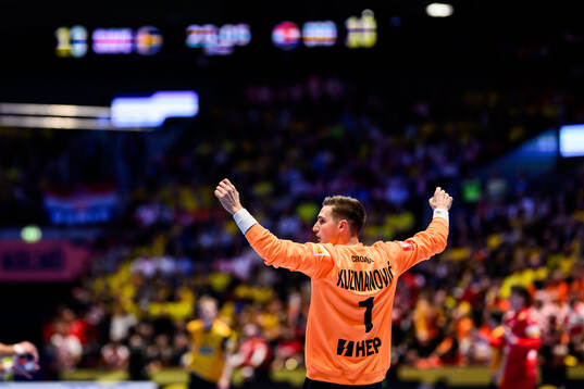 Goalkeeper Dominik Kuzmanovic of Croatia celebrates