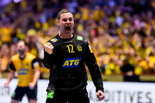 Goalkeeper Andreas Palicka of Sweden celebrates