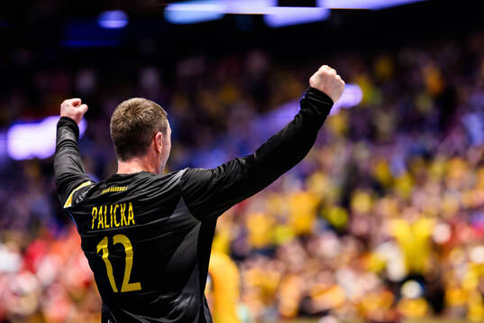 Goalkeeper Andreas Palicka of Sweden celebrates