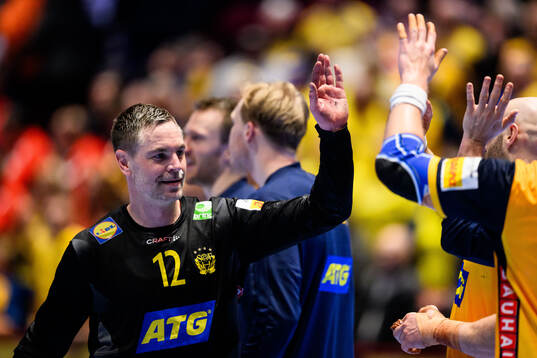 Goalkeeper Andreas Palicka of Sweden celebrates