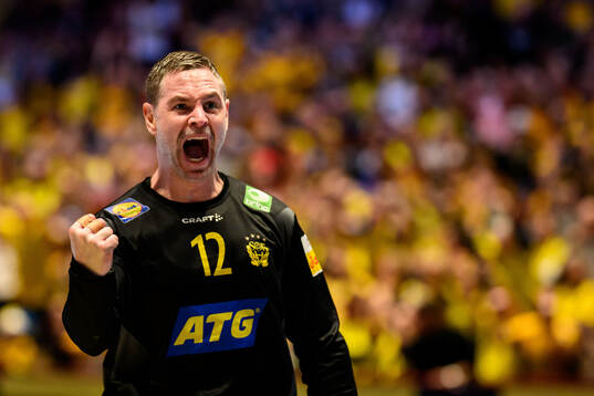 Goalkeeper Andreas Palicka of Sweden celebrates