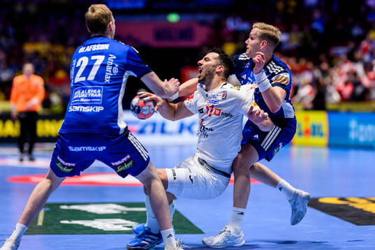 Zvonimir Srna of Croatia against Einar Thorsteinn Olafsson